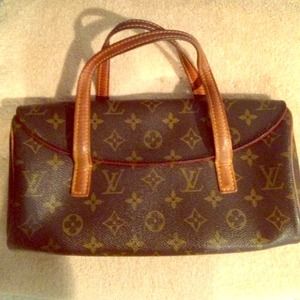 Louis Vuitton Clutch