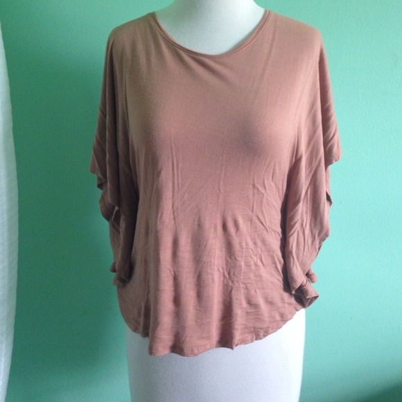 Peach butterfly sleeve top.