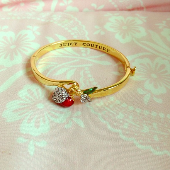 Rhinestone encrusted heart/apple bracelet.