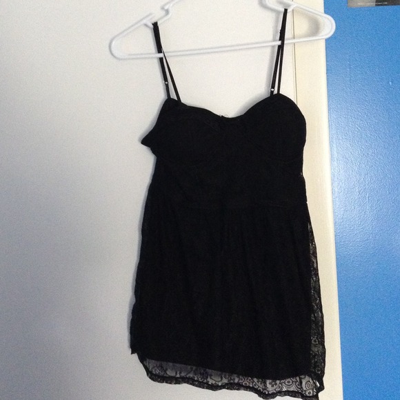 Black corseted top.