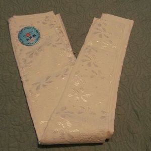 White embroidered jeggings, super cute.