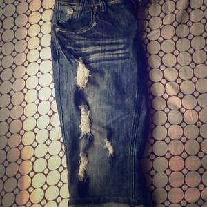 Mid calf length destressed dEnim jeans