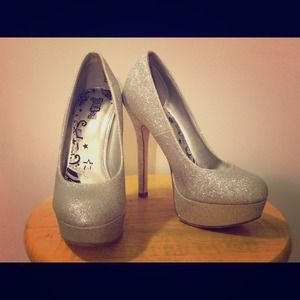 Sparkly silver platform stiletto pumps, size 5.