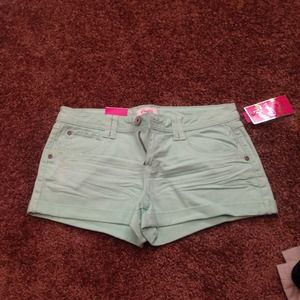 Greenish/ teal shorts