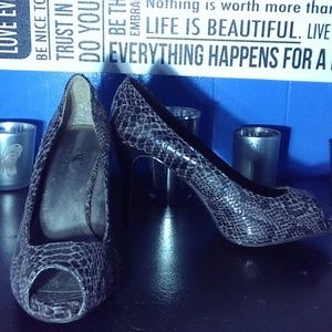 Snakeskin peeptoe pumps