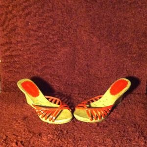 Tan high heels with light red straps