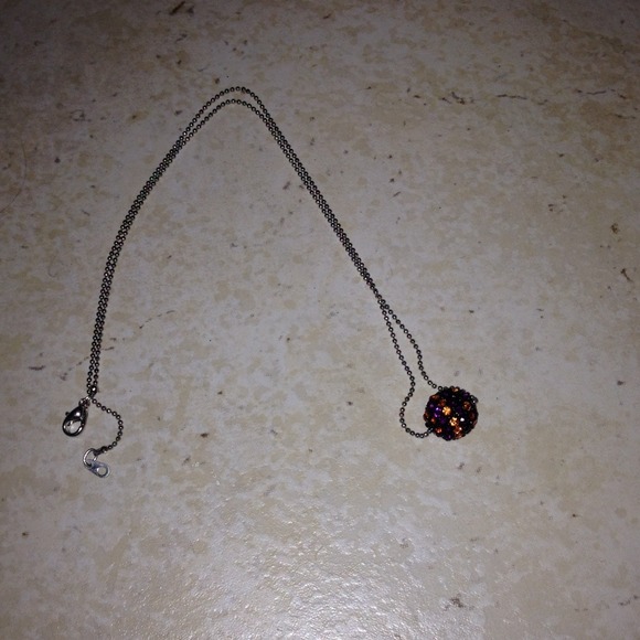 Necklace with black call with orange and purple