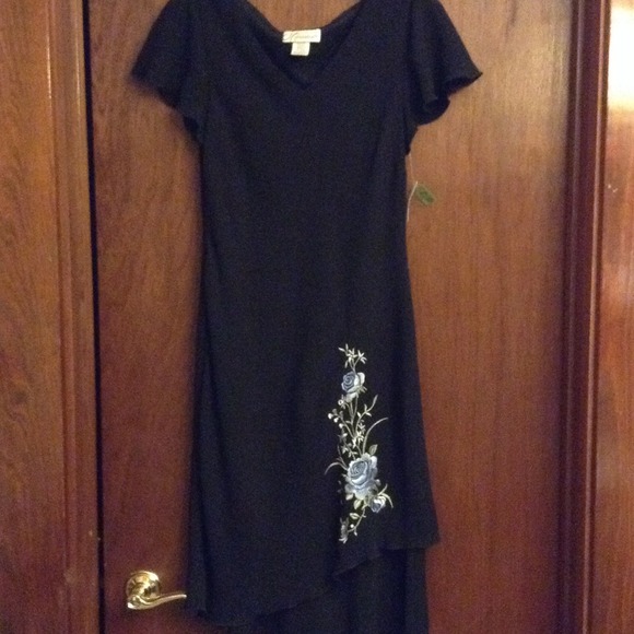 Black dress with embroidery detail. - Picture 1 of 3