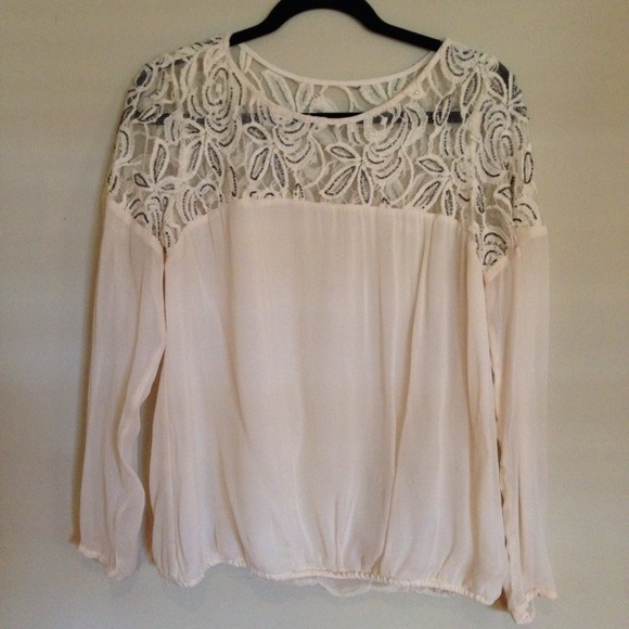 White with sequined rose blouse