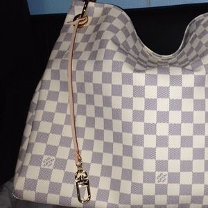 Bag charm on artsy, selling just the key fob.