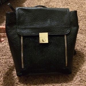 Black fake leather back pack