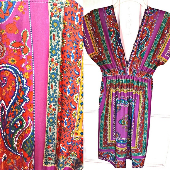 A purple low cut dress (back & front)