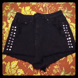Black shorts with silver studs on the side