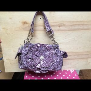 New purple purse with rhinestone flower center