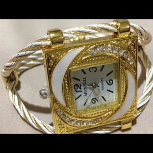 White and gold watch