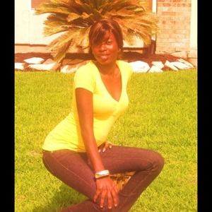 Yellow cotton short sleeve shirt.