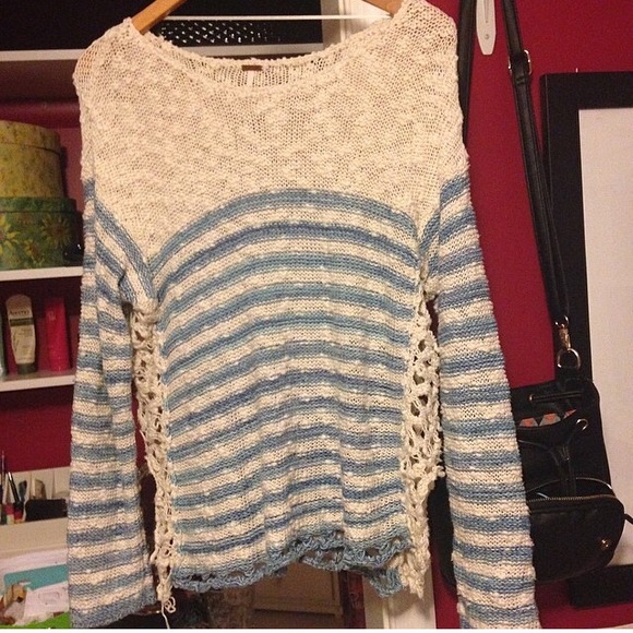 A blue and white Freepeople sweater