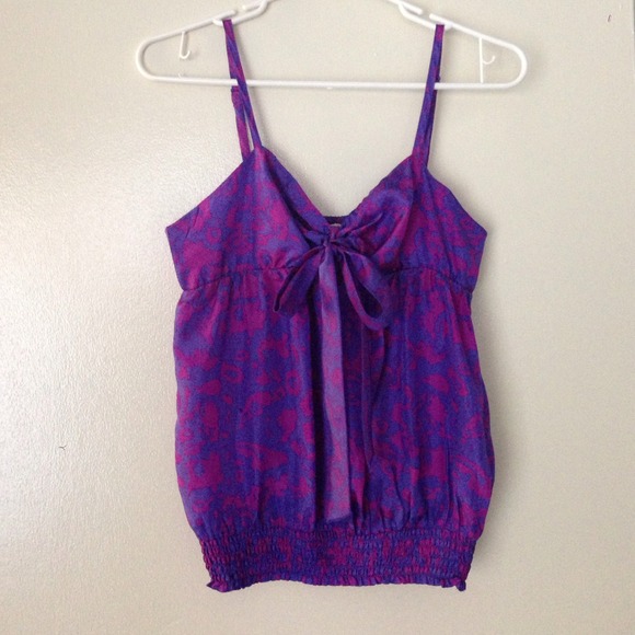 Purple top with bow in front