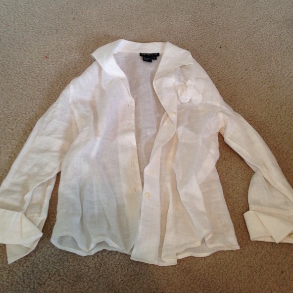 Cute white button up with flower! By Tracy M.