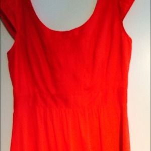 Ever popular orange , flattering dress