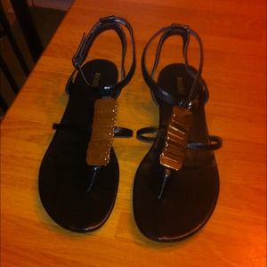 Black and gold sandals