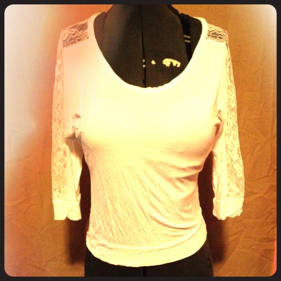 White top with strip of lace on sleeve