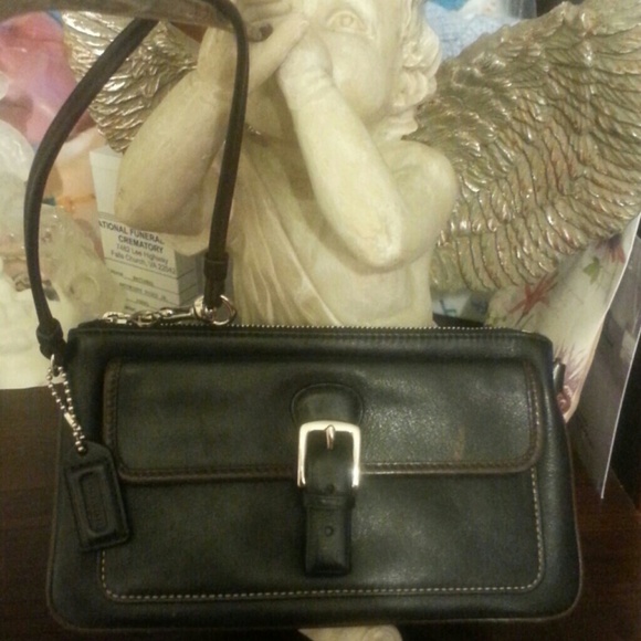 Coach Black and brown wristlet and blue lace shit