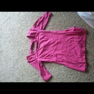 Pink top with bows in back