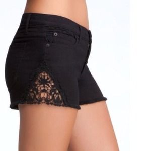 Bebe black lace cut off shorts size 24