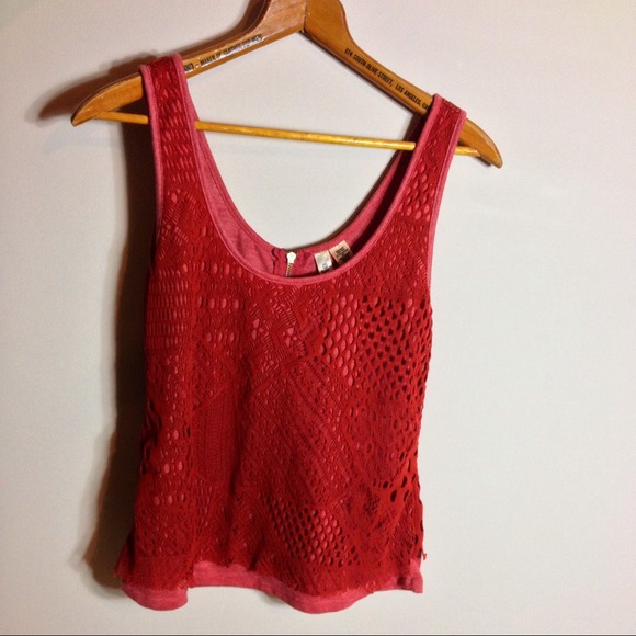 Crochet patterned tank top.