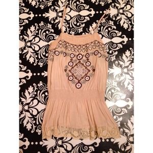 A very unique Aztec tank top 😊