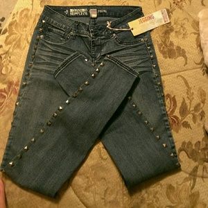 Studded skinny jeans