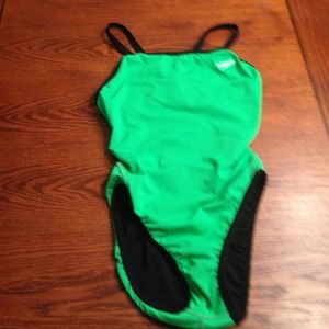 Green/black reversible swimsuit