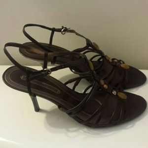 Brown and gold Bandolino sandals.