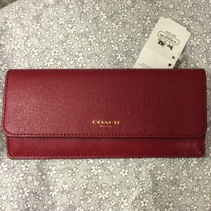 Coach saffiano soft wallet. New with tag. Scarlet