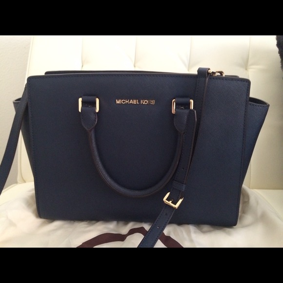 Michael Kors Handbags - Authentic new navy Michael kors Selma