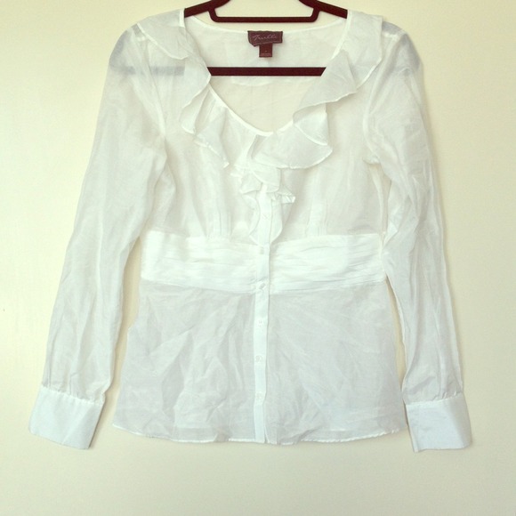 White ruffled button down