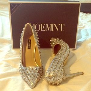 Silver spike shoes