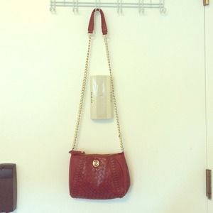 Red cross body with gold chain strap