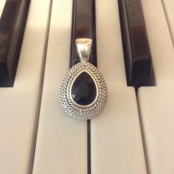 Silver and black necklace pendant