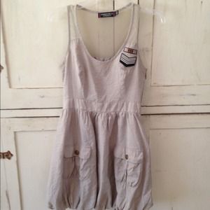 Military inspired dress with bubble hem/mesh back