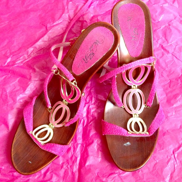 Wooden 3 inch heels with pink leather straps.
