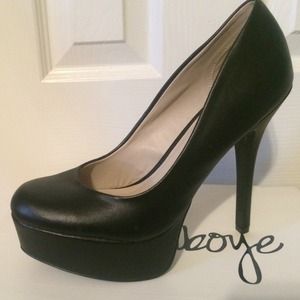 New. Black Isenboye heels.