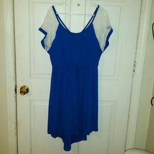 Blue high - low dress with white lace accents