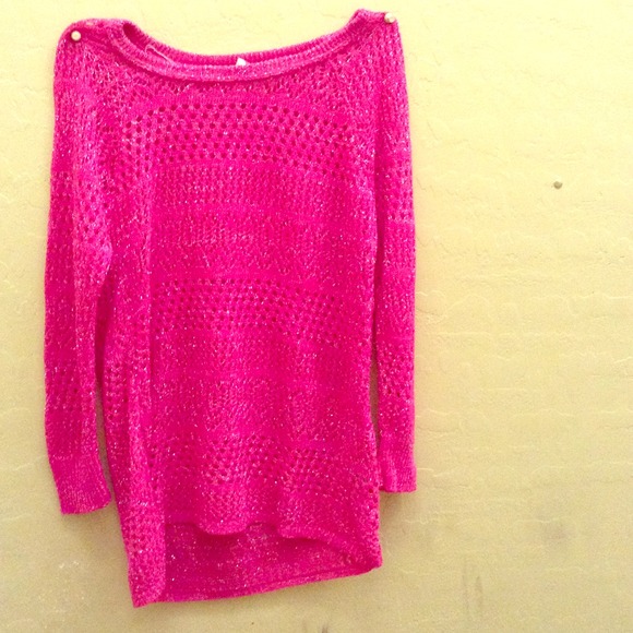 A pink knitted sparkly shirt ,no rips or tears