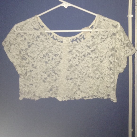 See thru floral crop top .