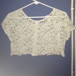 See thru floral crop top .