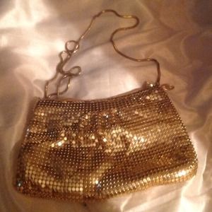 DONATED - Gold dressy handbag.