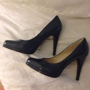 Unique smoky grayish blue pumps with platform.