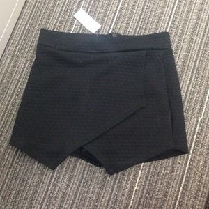 Bebe asymmetric shorts